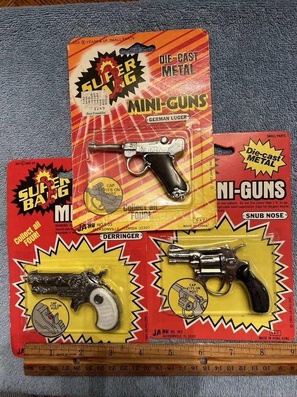 (3) MINI GUNS (3) ORIGINAL WRAPPING