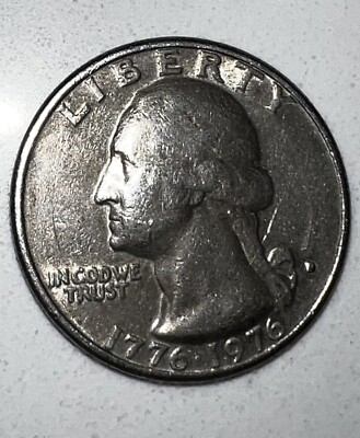 1976 bicentennial quarter filled d A&M touching