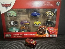 Disney Pixar Cars Mini Racers 10-Pack: UPDATED LMQ RUST EZE Racing Center