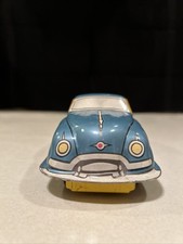 Vintage Blue Woody Friction Motor Tin Car