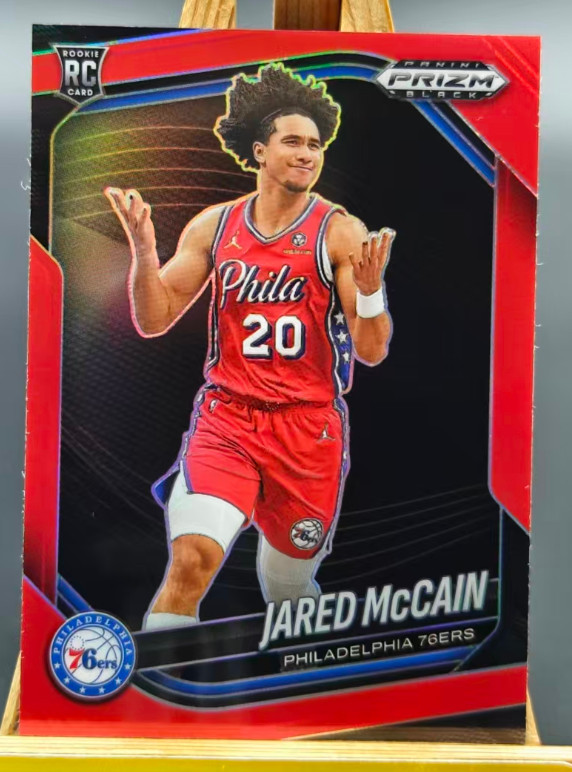 Jared McCain 2024-25 Panini Prizm Black 141/299 Red RC 76ers #80