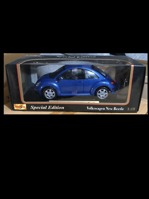 1999 Volkswagen New Beetle BLUE 1:18 Maisto 31875 | eBay