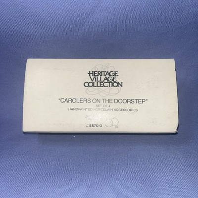 RETIRED DEPARTMENT 56 HERITAGE VILLAGE CAROLERS ON THE DOORSTEP ITEM #5570-0 B