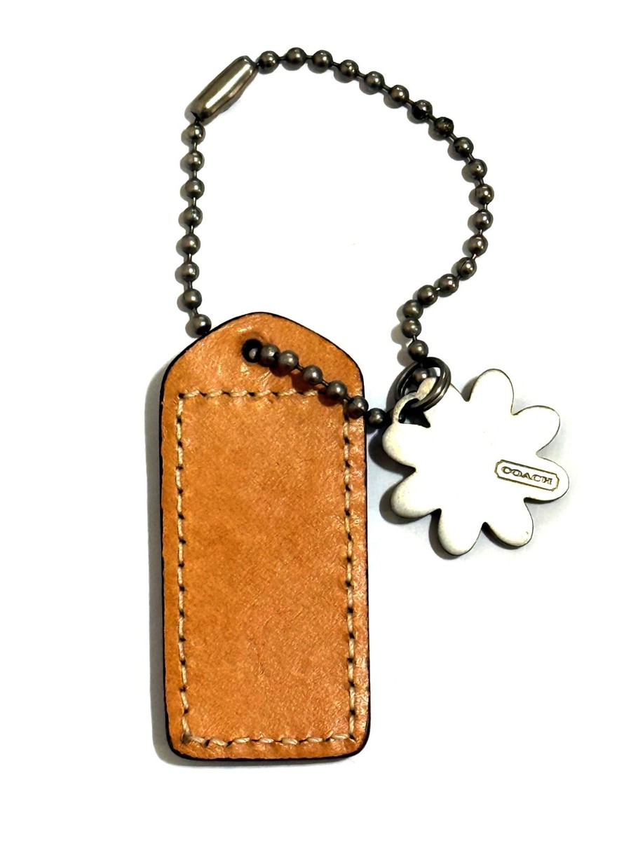NICE VINTAGE COACH EMBOSSED GREEN LEATHER DAISY MOTIF BAG HANGTAG
