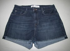 Womens Levi Strauss High Rise Jean Shorts. Size 12/31 Blue. Cuffed Raw Hem.