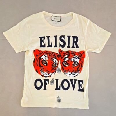 GUCCI トラプリント Tシャツ ELISIR OF LOVE Gucci Elisir of Love Graphic Sequin Embellished Tiger Print T