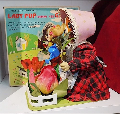 Vintage Tin Battery-Operated Lady Pup Tending Her Garden, Tomiyama, Japan. EXiB