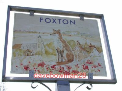 PHOTO  FOXTON VILLAGE SIGN WEST SIDE AS MIGHT BE EXPECTED THIS SHOWS A FOX AND A