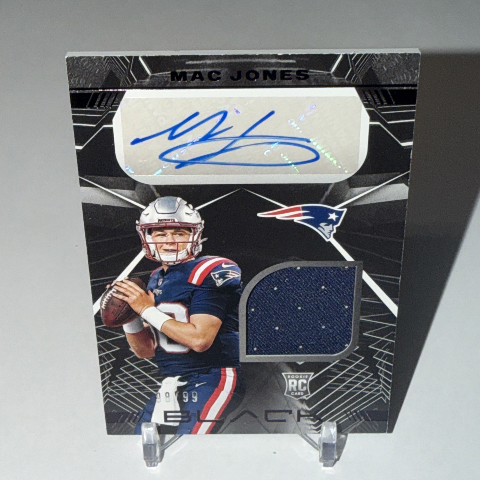 Mac Jones Panini Black Rookie Signature Materials #RSMMJ Base