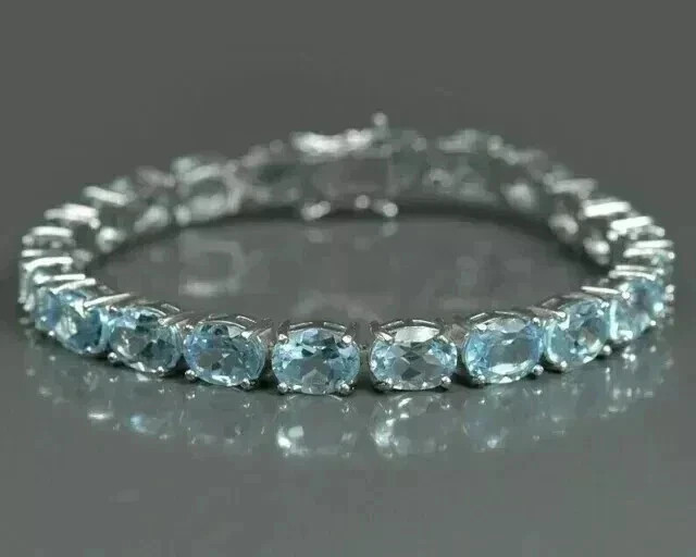 9Ct Oval Cut Lab Created Aquamarine 7.5