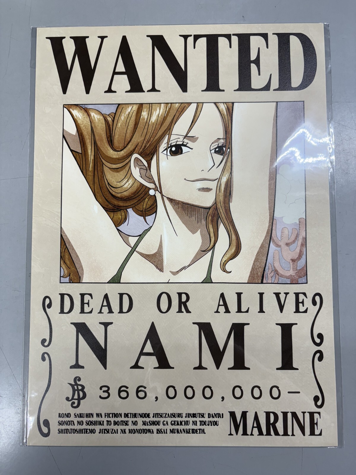 Póster oficial de Nami - One Piece Mugiwara Store Marine Wanted