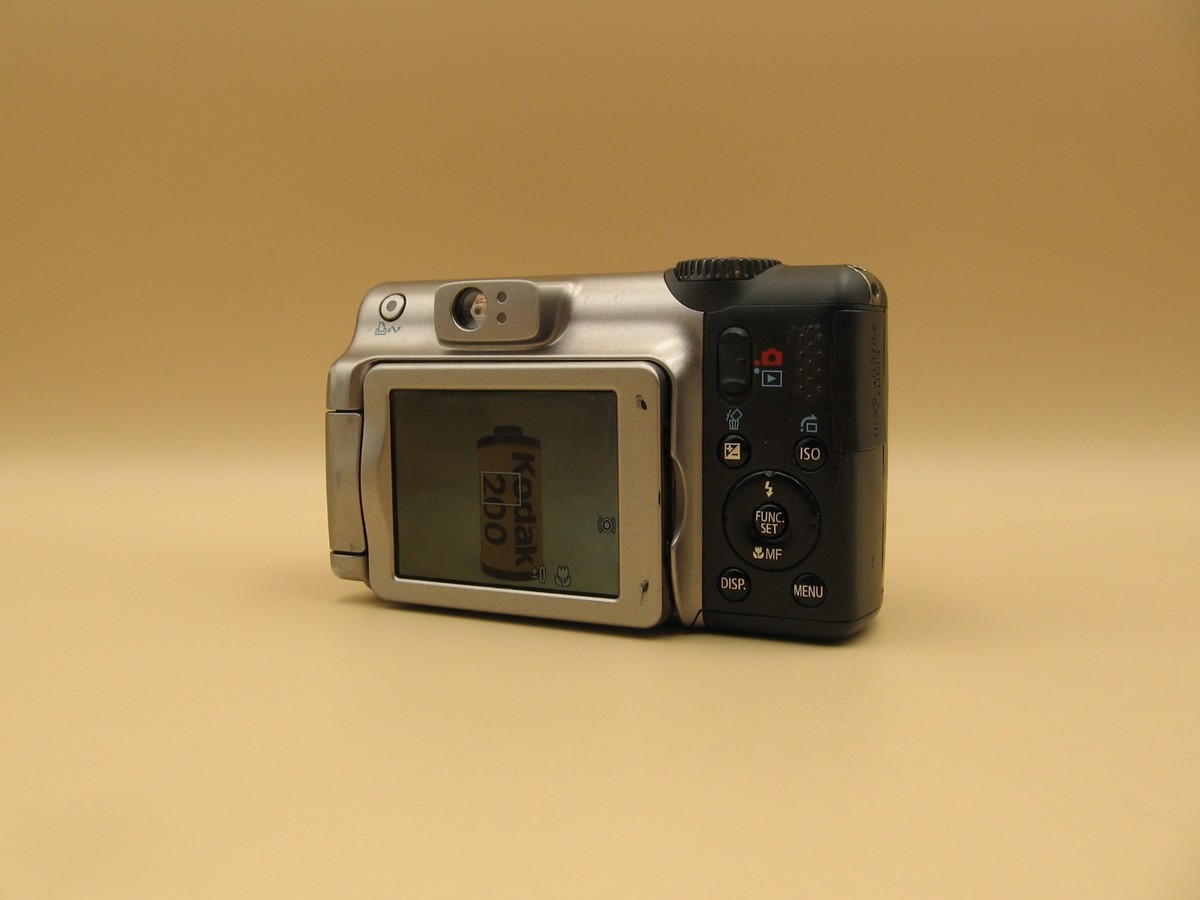 Canon PowerShot A650 IS 12.1MP CCD Flip Screen CCD Digital Camera