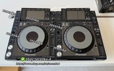 A pair of Pioneer CDJ2000nexus DJ turntables