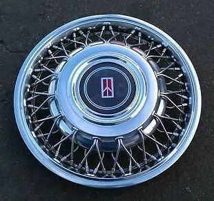 1 OLDSMOBILE TRONCO ESPECIAL RADIO DE ALAMBRE CONTINENTAL Tapacubos centrales de rueda #10097502 Foto 4 de 4