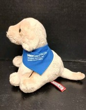Perro cachorro de peluche Nexgard Plus Flea & Tick Med publicidad por Douglas