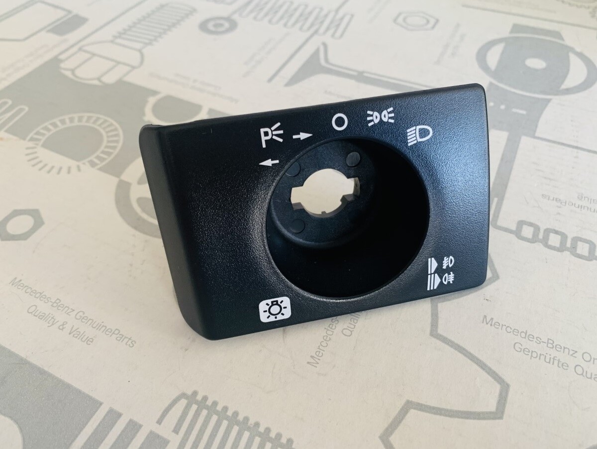 985/ Mercedes-Benz Leuchtweitenreg. Verkleidung Abdeckung  