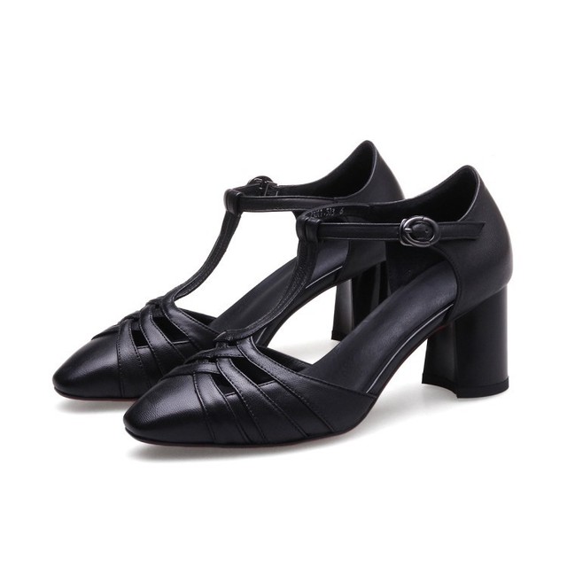 ladies black and white pumps