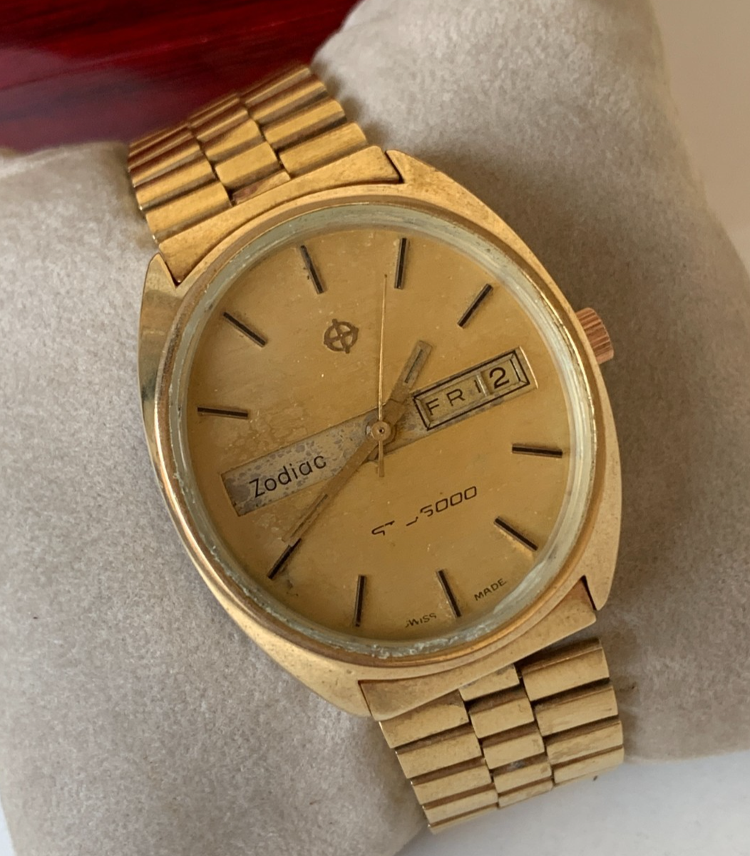 1970'S VINTAGE ZODIAC SST 36000 WATCH OVAL DAY-DATE GOLD PLATED