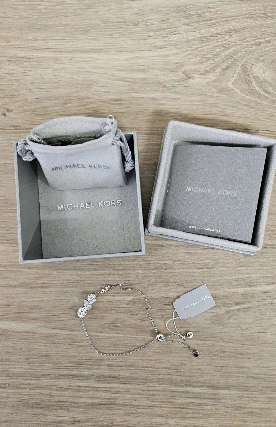 MICHAEL KORS Bracciale Michale Kors argento sterling zirconi nuovo con etichette e scatola