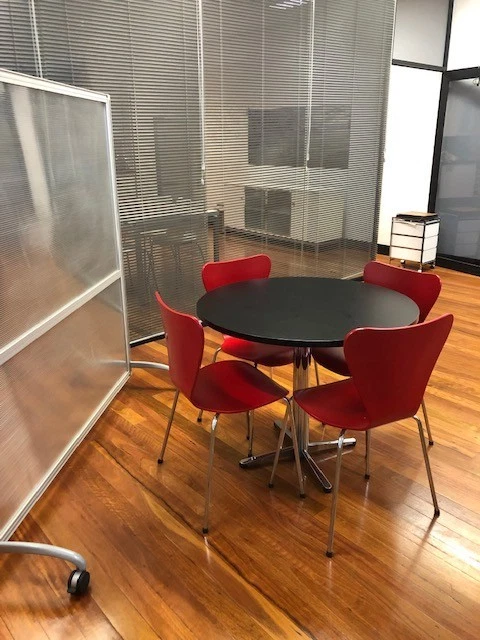 Round black table Plus 4 red chairs - Used in immaculate condition - image 2 of 4