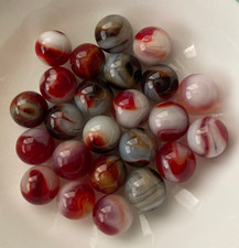 Lot of 24 UV Reactive Red and White Machine Made Marbles Cadmium