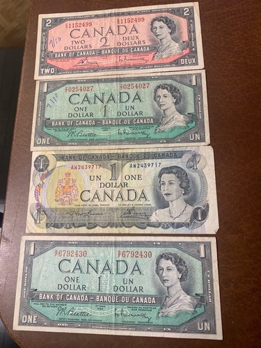 2 1954 ottawa un canda dollars 1 1973 ottawa and 1 two dollar duex 1954 ottawa