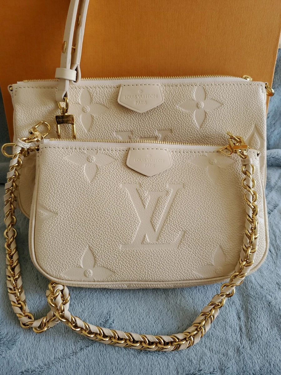 Cream louis 2025 vuitton purse