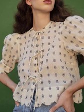 White Peplum Puff Sleeves Blouse With Blue Geometric Pattern