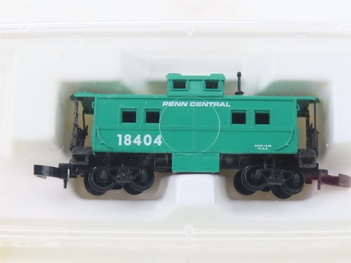Microtrenes Kadee escala Z MTL 14706 PC Penn Central Caboose #18404 | Zustand: Used