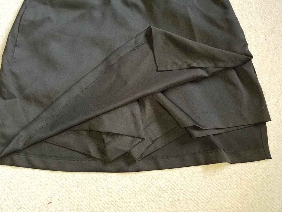 Mujer Skort-ASHWORTH-GOLF-negro elástico rendimiento frente plano-8 Foto 3 de 4