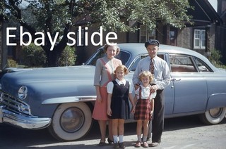 Orig 1950s 35mm Kodachrome slide Family with Lincoln sedan on street