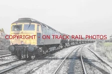 UK RAILWAY PHOTOGRAPH OF CLASS 47 47104. RM47-2773