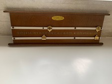 vintage wood and brass billiards scoreboard manufactured by E.A. Clar
