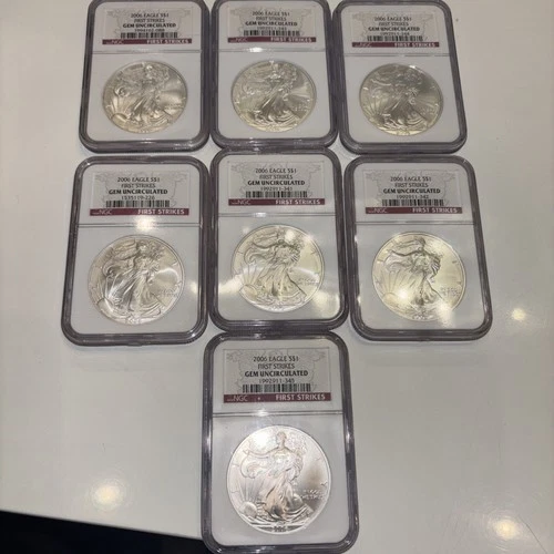 Lot Of 7 2006 $1 AMERICAN SILVER EAGLE  NGC AS GEM UNCIRCULATED FIRST STRIKE