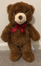 Classic Brown Teddy Bear with Red Bow Timeless TeddyA Brown Bear with a Red Bow