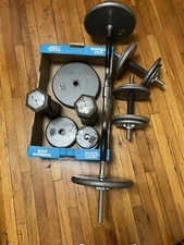 loose weights dumbells curling bar