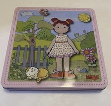 HABA Dress-up Doll Lilli Magnetic Travel Toy, 50 Magnet Pieces 4 Background