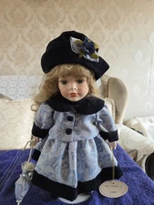 Leonardo Collection Porcelain Doll - named 'Lucy'