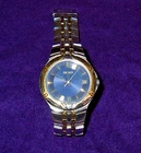 Seiko 7N42-6C10 Men's SS Gold Tone Trim Quartz Watch Date Blue Dial