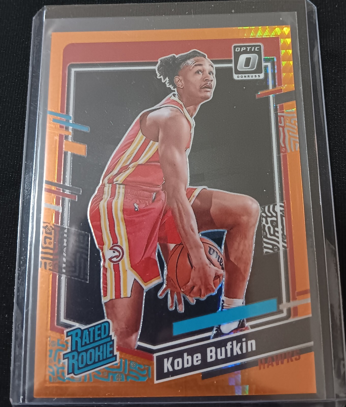 2023-24 Donruss Optic #220 Kobe Bufkin Hyper Orange Prizm /99 Rookie Hawks