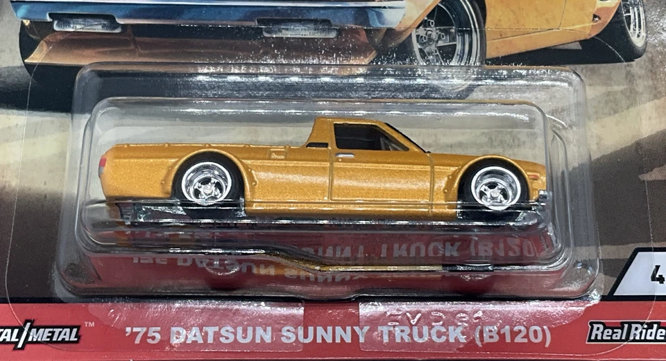 Hot Wheels Premium JH3 Japan Historics 75 Datsun Sunny Truck Real Riders Protect Foto 3 de 4