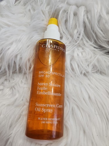clarins sun oil spray