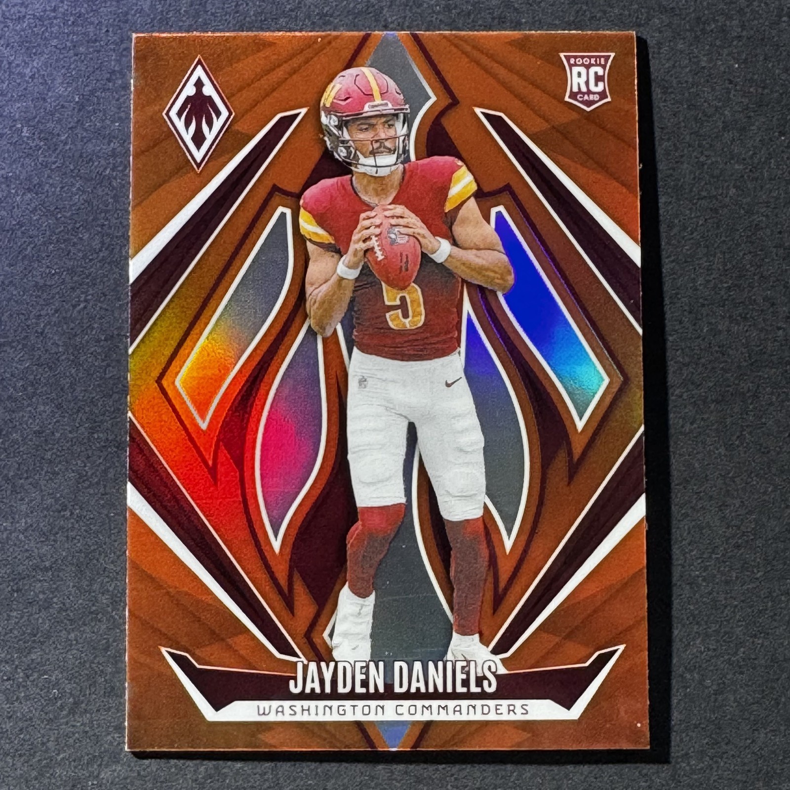 JAYDEN DANIELS 2024 Panini Phoenix Rookie Orange Fade Prizm #198 (RC)