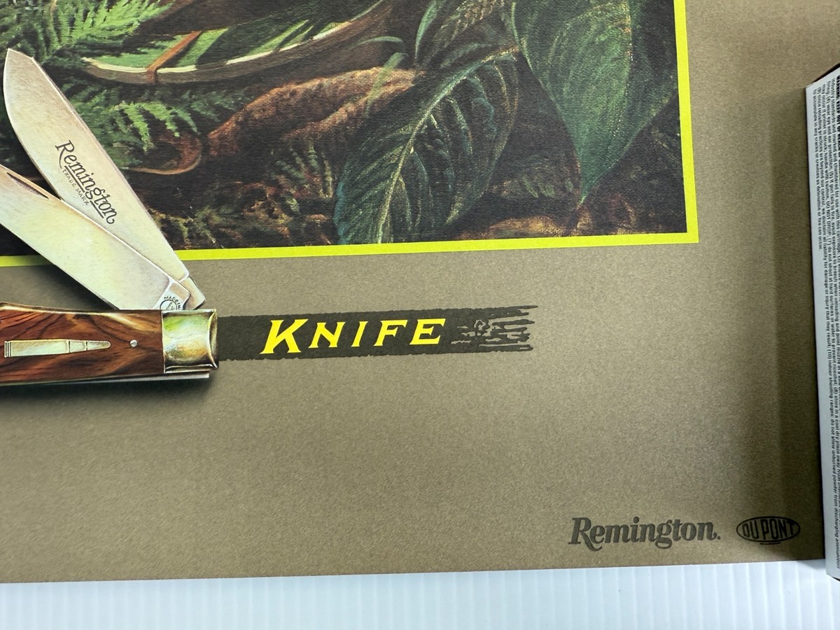 1988 Vintage Remington The Trapper Bullet Knife Poster Out on a