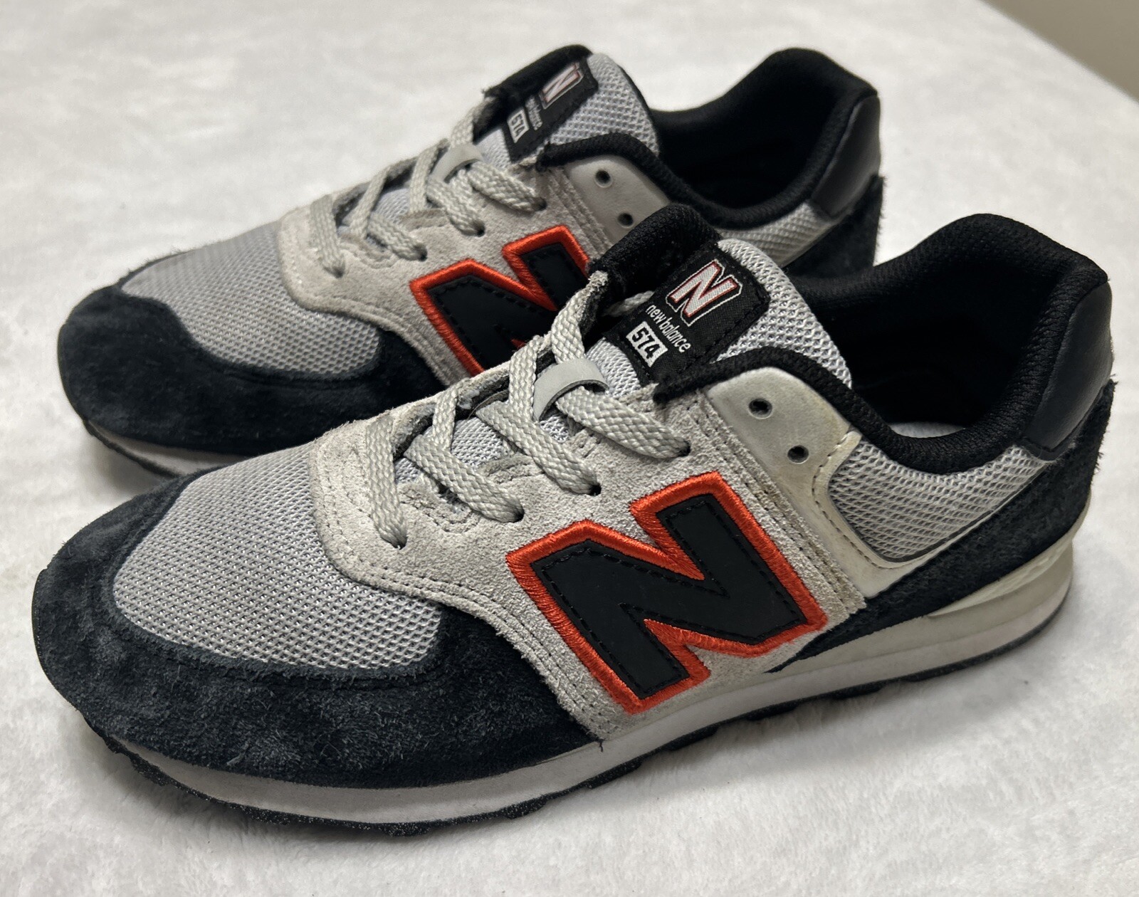 New Balance 574 v1 Athletic Shoes Sneakers Size Kids 5 Grey Black Red GC574SV1
