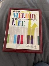 Melody of Life collectible Rose Parade Red Wo...