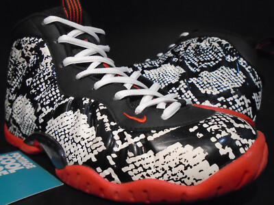 white and orange foamposites