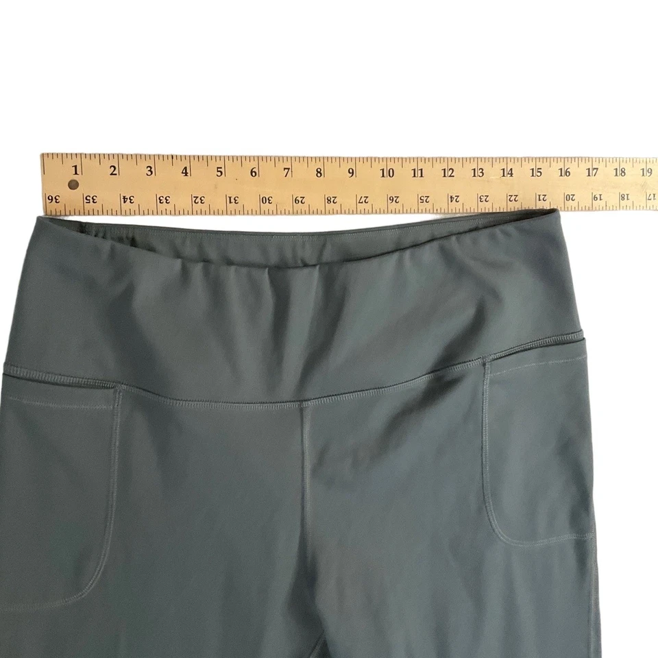 Pantalones capri deportivos Under Armour gris cintura elástica bolsillos laterales logotipo 2X Foto 4 de 4