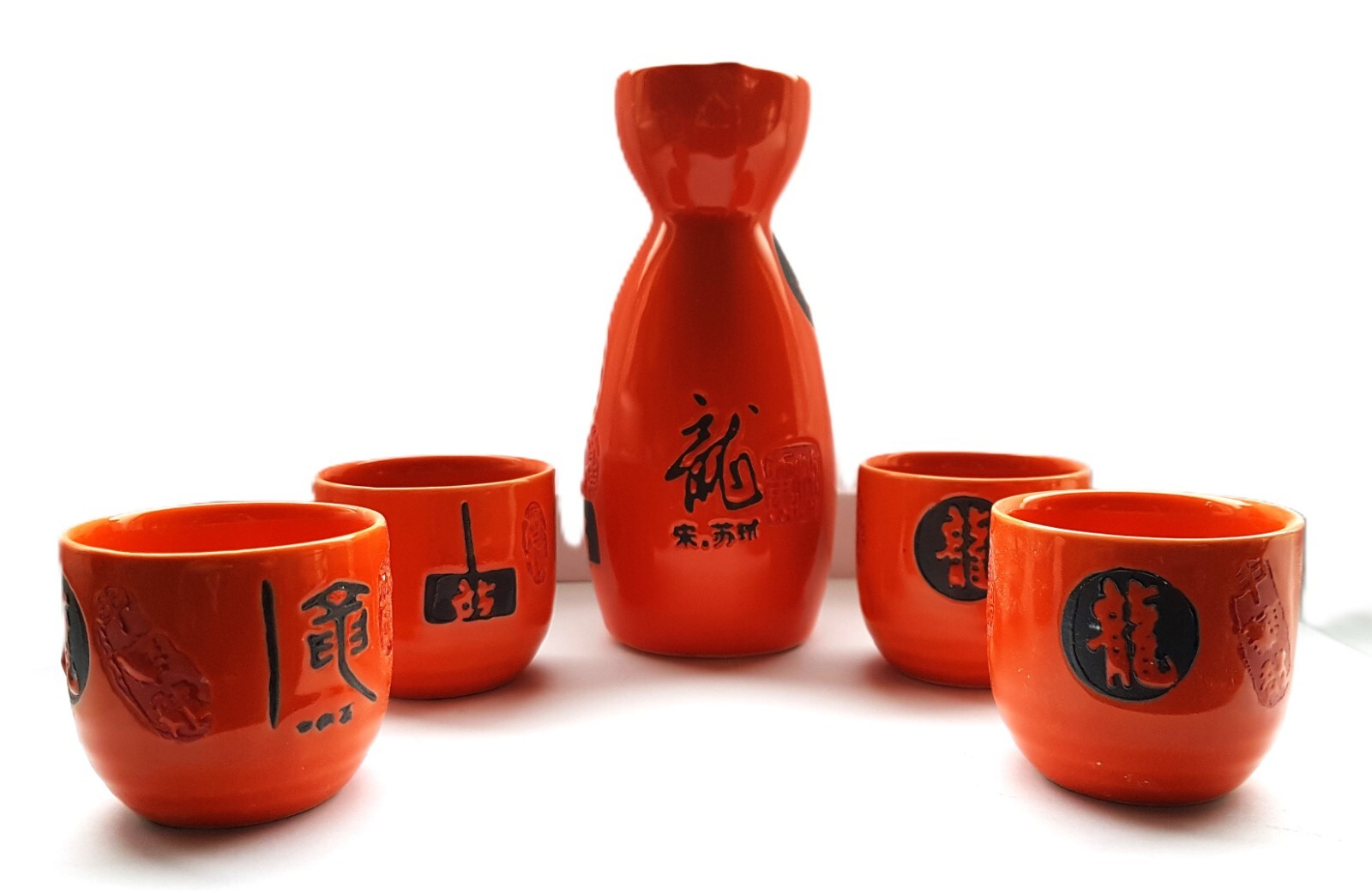 JUEGO DE SAKE JAPONÉS PORCELANA - Diseño naranja quemado - 4 tazas de porcelana y jarra de sake