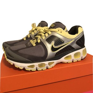 gray and yellow nike shoes